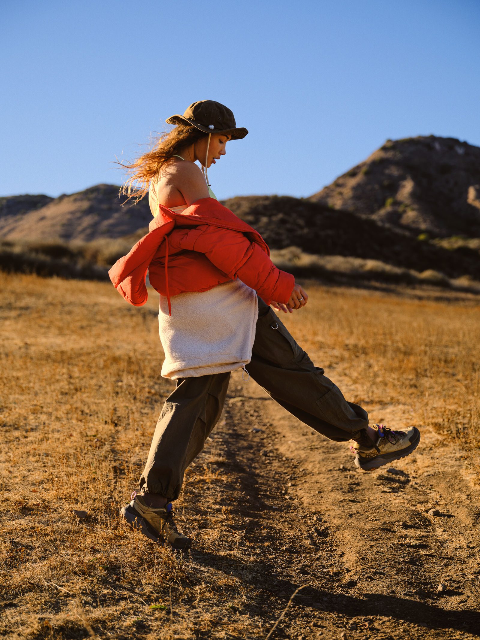 Editorial image, streetwear styling, outdoor backdrop